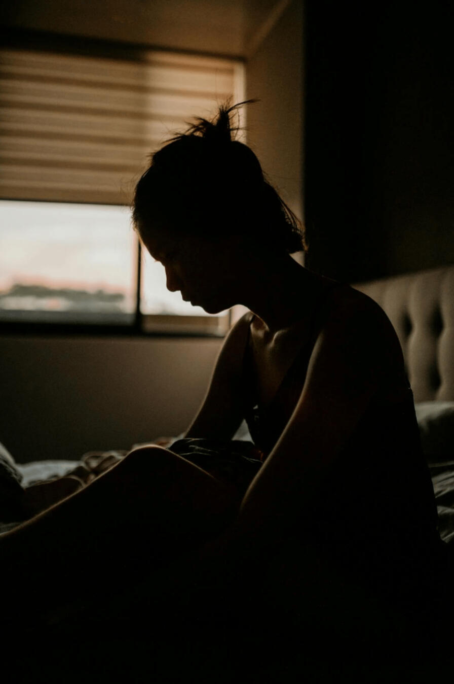 Soulscience Psychic Healing Reading An ill lady sits up in bed to receive the warmth that comes from the psychic healing energy