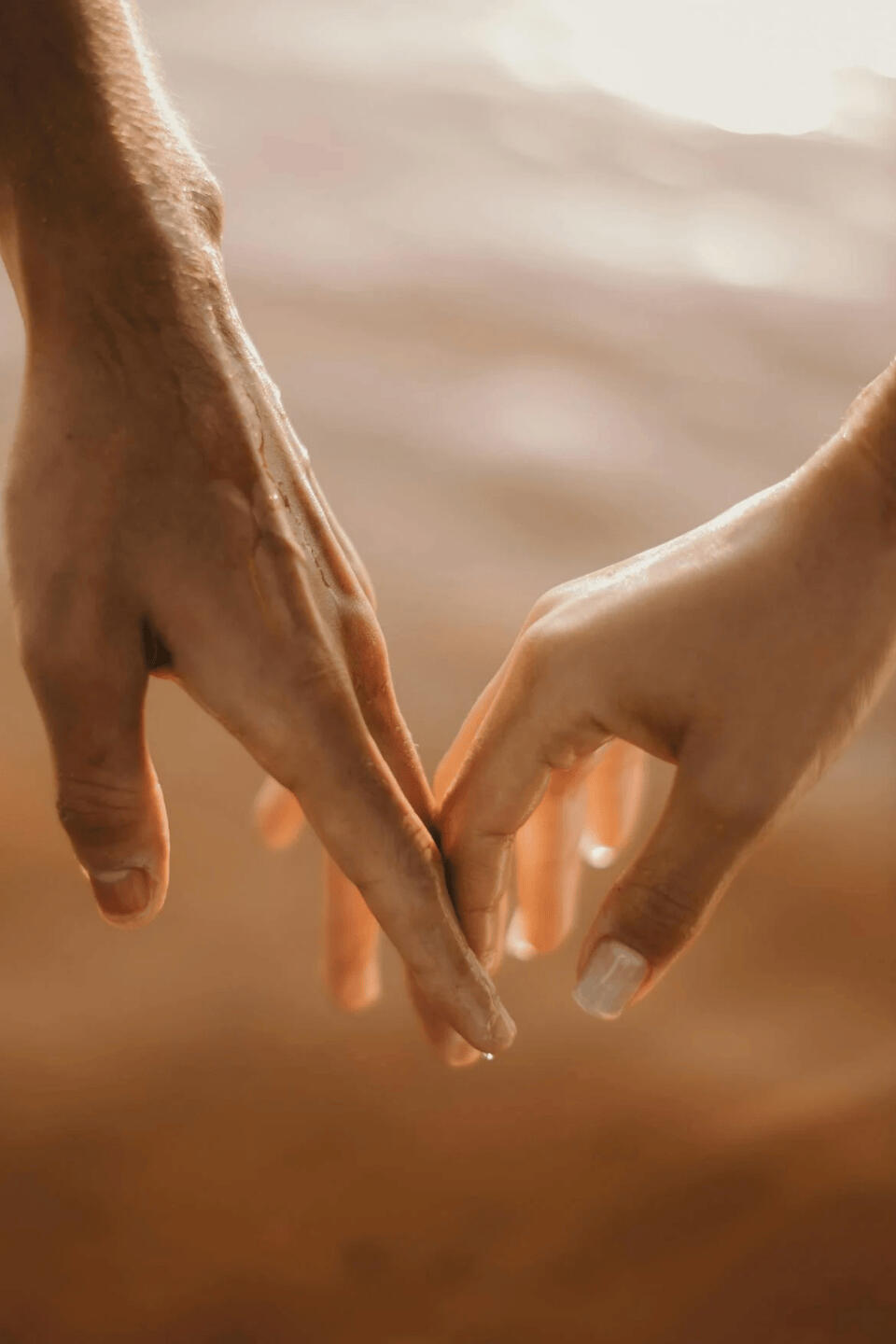 Love and relationships psychic guidance and tarot reading A couple holding hands after getting a love psychic reading